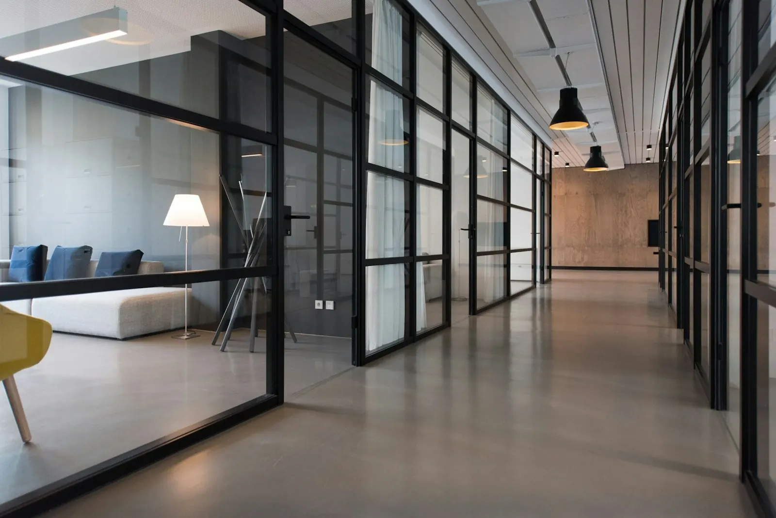 Office corridor with glass walls — a stand-in for transparency and access control